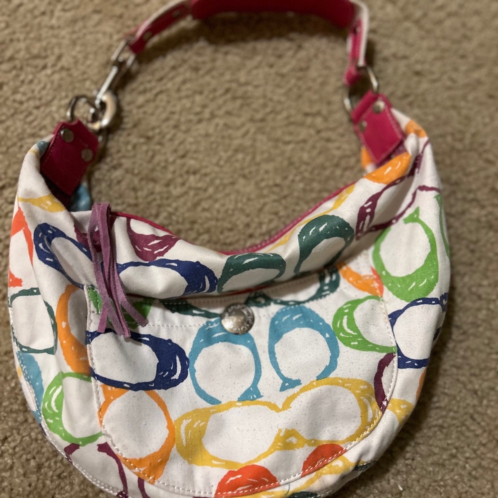 Coach shoulder half moon shape handbag The measurements are in the photos.